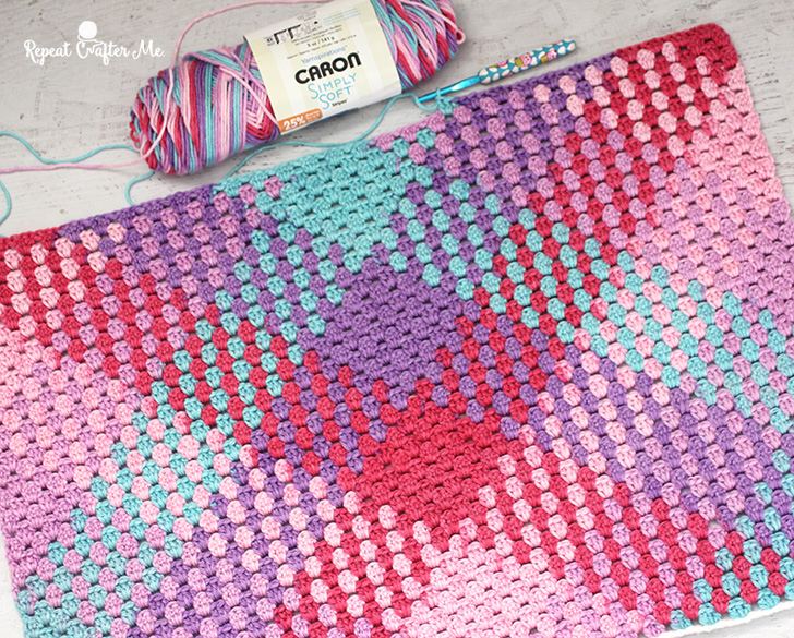 Finished my first blanket! C2C using Red Heart Neon Stripes. Still